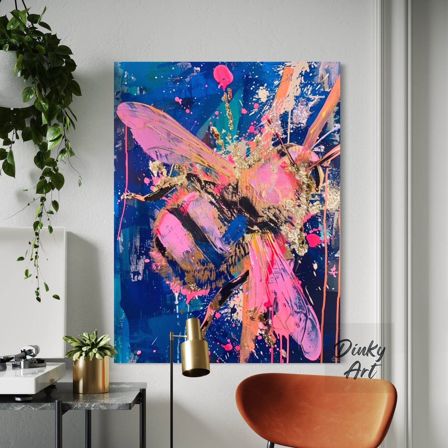 Abstract painting of a bee on a wall in a modern interior setting with a plant and chair.